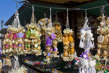 Hand made accessories and colorful natural herbal soaps on a rope - original souvenir from Slovakia