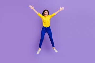 Fototapeta na wymiar Full length body size view of attractive cheery crazy girl jumping fooling isolated over bright violet purple color background