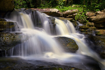 Obraz premium Tad noi waterfall at Na Yung - Nam Som National Park Udon Thani Province, Thailand
