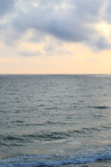 Fototapeta premium blue foamy waves on the beach