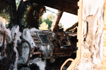 Fototapeta premium Destroyed and burned russian armored military vehicle interior