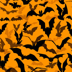 Seamless Halloween vector pattern with various flying bat silhouettes on orange background. Texture with flittermouses for packaging, postcards, parties, decor, web, fabric.