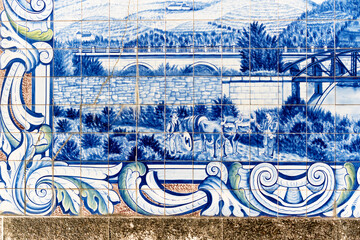 panels of azulejos, tiles, showing the work in the vineyards at the railway station of Peso da Regua, Portugal