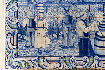 panels of azulejos, tiles, showing the work in the vineyards at the railway station of Peso da Regua, Portugal