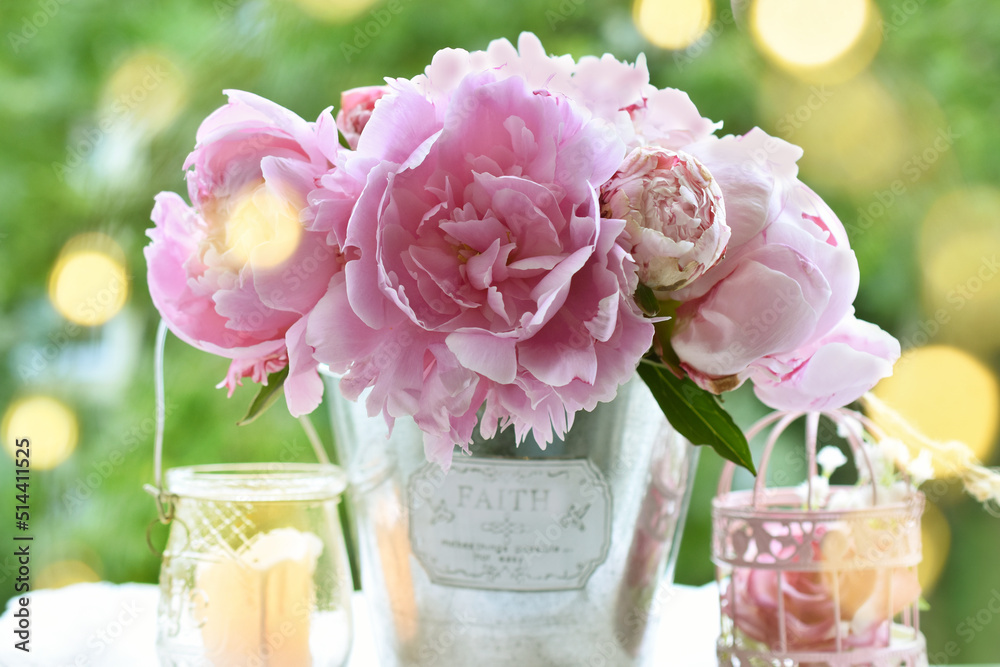 Wall mural bouquet of pink peonies in the garden in romantic style