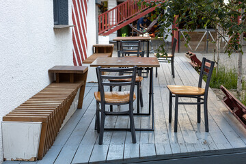 empty table and chair in summer cafe