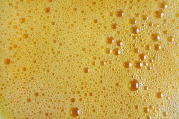 Background, yellow thick liquid with air bubbles ... 