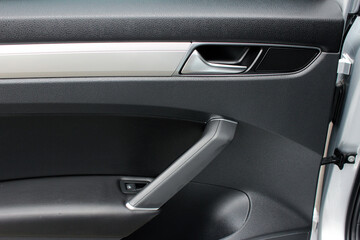 Door handle with windows controls. Passenger door trim. Window switches.