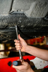 Oil change of a car engine.