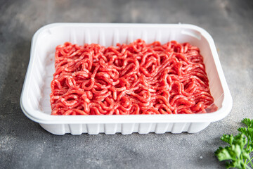 raw minced meat pork, beef, lamb cuisine fresh healthy meal food snack diet on the table copy space food background rustic top view