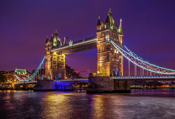 Tower Bridge at night. Tower Bridge in London, the UK at night. Panorama of the city centre. London postcard.