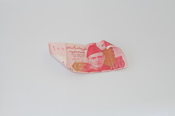 pakistani currency note of 100 rupees on white background