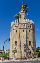 Fototapeta na wymiar Historic Golden Tower in the center of Sevilla, Spain