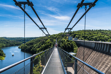 Titan RT rope suspension bridge over the Rappbodetalsperre (rappbode dam) in the Harz Mountains in...