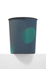 Close-up shot of a gray plastic trash can with a green print. The cylindrical waste basket with a print is isolated on a white background. Front view.