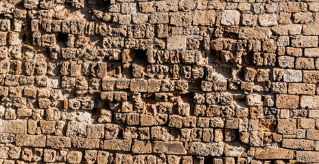 Wall and floor made of old stone material, background image.