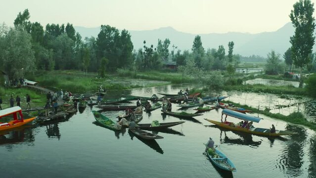 Rainawari, India - 03 June 2022: Aerial view of group of typical home in the middle of the swamp, Rainawari, Srinagar, Jammu and Kashmir, India.