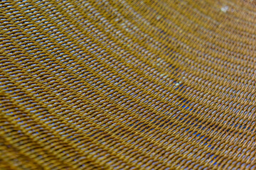 Seat upholstery made of wicker material.
