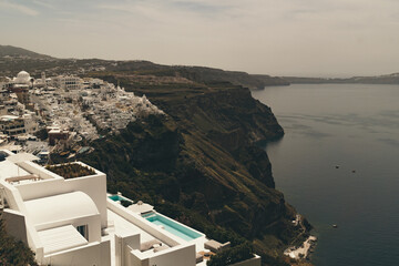 Obraz premium View across Fira in Santorini, Greece. Retro colour grade so create vintage look and style.