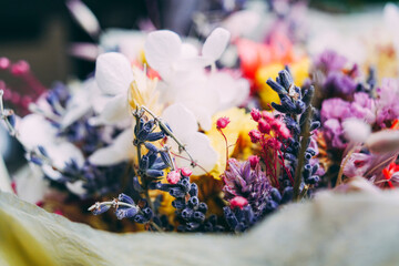 romantic bouquet of dried flowers, bright purple-yellow bouquet with lavender