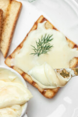 Fresh sandwich with cream cheese and butter for breakfast. melted cheese sandwich on light background. Food recipe background. Close up