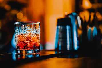 Cocktail Negroni with gin, campari martini rosso and orange. negroni cocktail at the bar