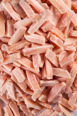 Close-up of frozen chicken meat strips