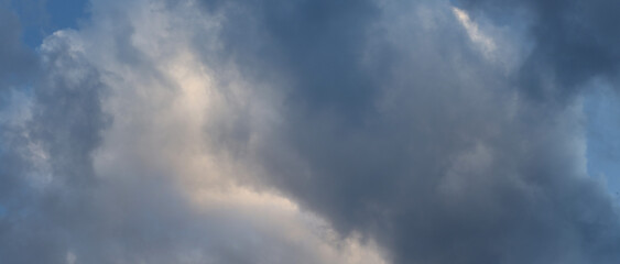 Obraz premium Background from storm clouds on the blue sky.