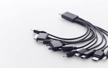 different types of charger connectors for phones, on a white background