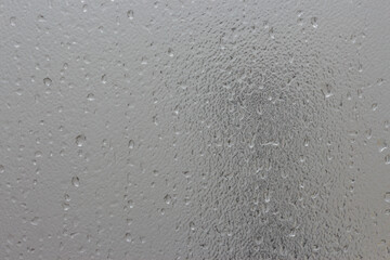 Water drops on frosted glass