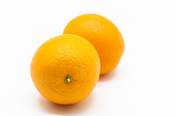 Fresh whole orange fruit isolated on white background