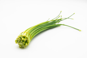 fresh chives close up isolated on white background.