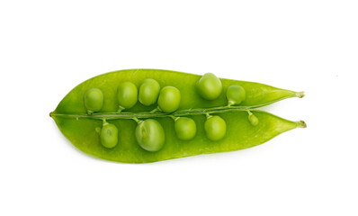 Green peas on a white background, top view.