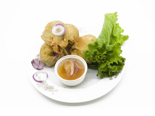 Crispy deep fried Singaras isolated on white background