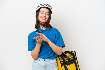 Young Ukrainian woman with thermal backpack isolated on white background applauding after presentation in a conference