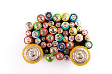Composition with alkaline batteries on white background. Chemical waste. Top view.