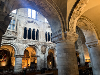 Interior of St. Bartholomew the Great medieval church in City of London. London, England. The Priory Church of St Bartholomew the Great. Anglican church situated at West Smithfield. ceiling, light