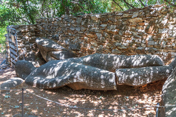 Naxos Greece 06-02-2022. 
Broken statue lying on the ground. Called Kouros.  at Melanes traditional...