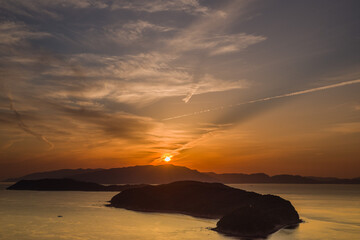 Fototapeta na wymiar 紀淡海峡（和歌山県加太市）の夕日