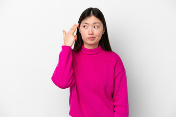 Young Chinese woman isolated on white background with problems making suicide gesture