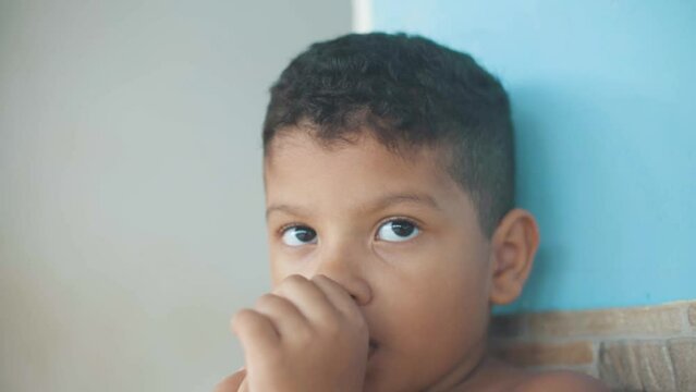 Angry Latin Boy Finds Himself Sucking His Finger, Close-Up