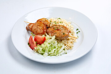 chicken with barley and salad