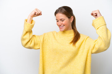 Young caucasian woman isolated on white background doing strong gesture