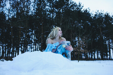 Girl in the snow forest