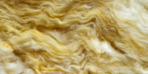 yellow mineral wool with a visible texture - obrazy, fototapety, plakaty