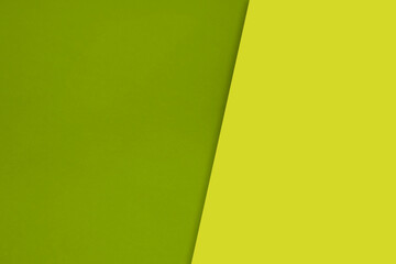Dark vs light abstract Background with plain subtle smooth de saturated green yellow colours parted into two