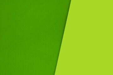 Dark vs light abstract Background with plain subtle smooth de saturated green yellow colours parted into two