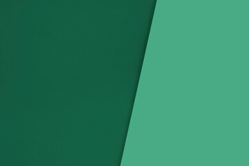 Dark vs light abstract Background with plain subtle smooth  de saturated green colours parted into two
