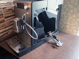 Automatic cleaning inside the coffee machine. Maintenance of household appliances.