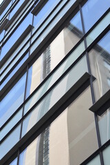 Looking up at modern buildings with a sky background. Taken in Salford Quays England. 